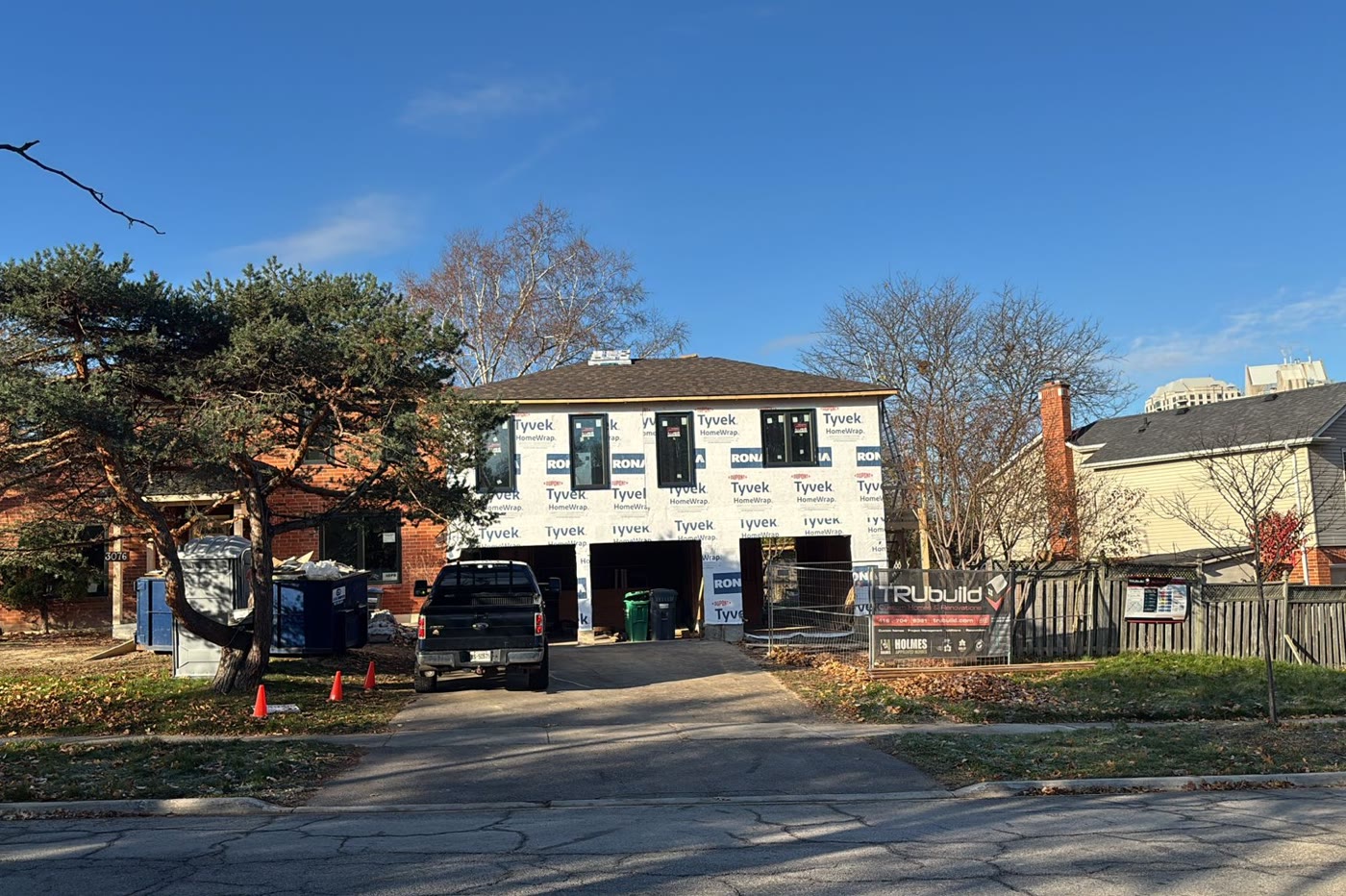Side addition and 3-car garage — Oakville